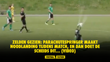 Zelden gezien: parachutespringer maakt noodlanding tijdens match, en dan doet de scheids dit... (VIDEO)