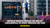 Dronken beelden: Engelse fan beklimt lantaarnpaal en wordt bekogeld met bier (VIDEO)